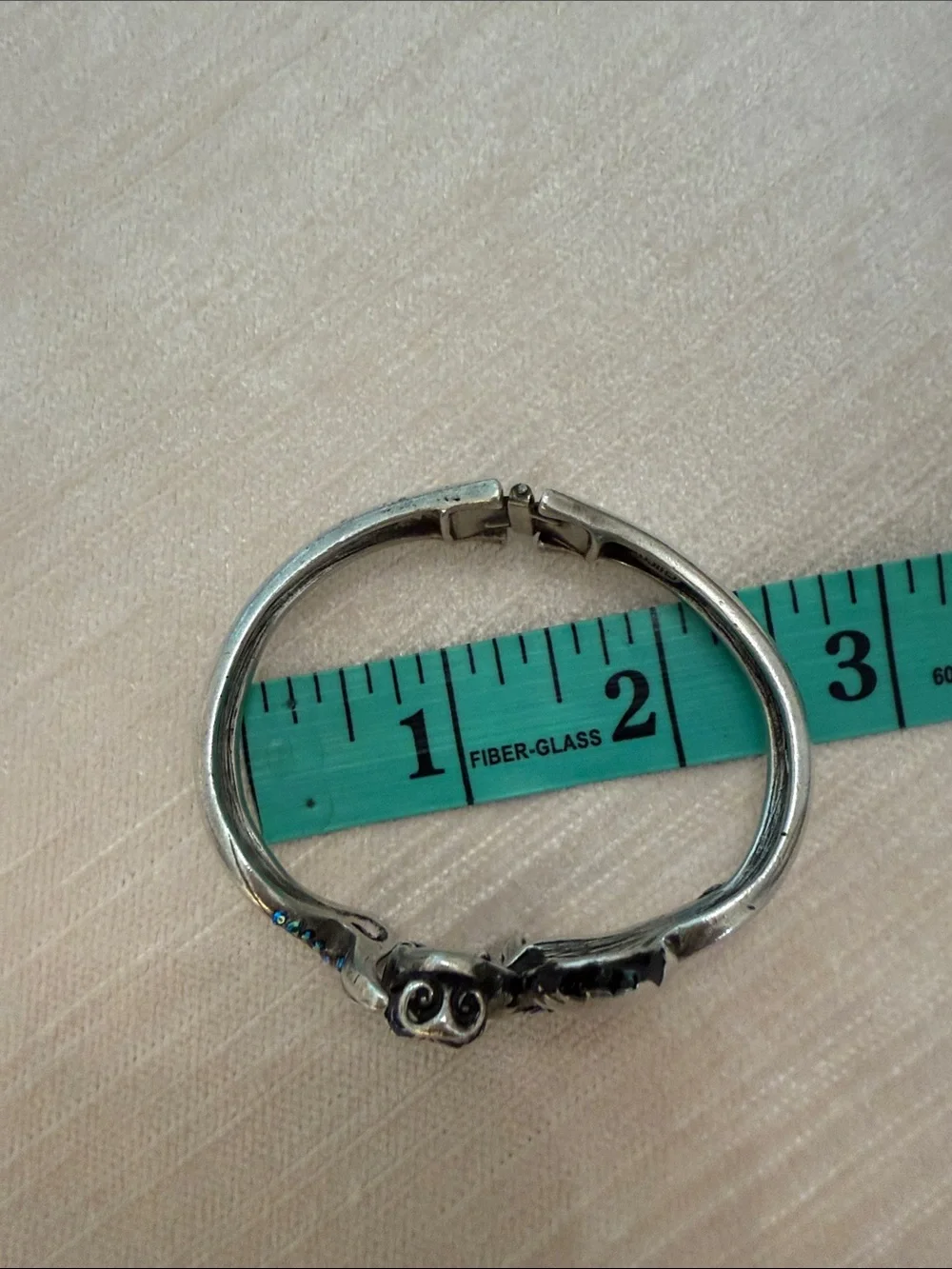 Chico’s water, dragon hinged Bracelet with Blue-Green Accents